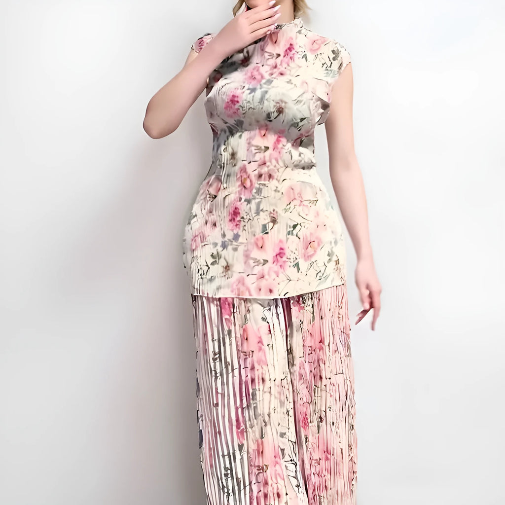 Long sleeve printed chiffon dress and top set on a hanger, showing high waist design.