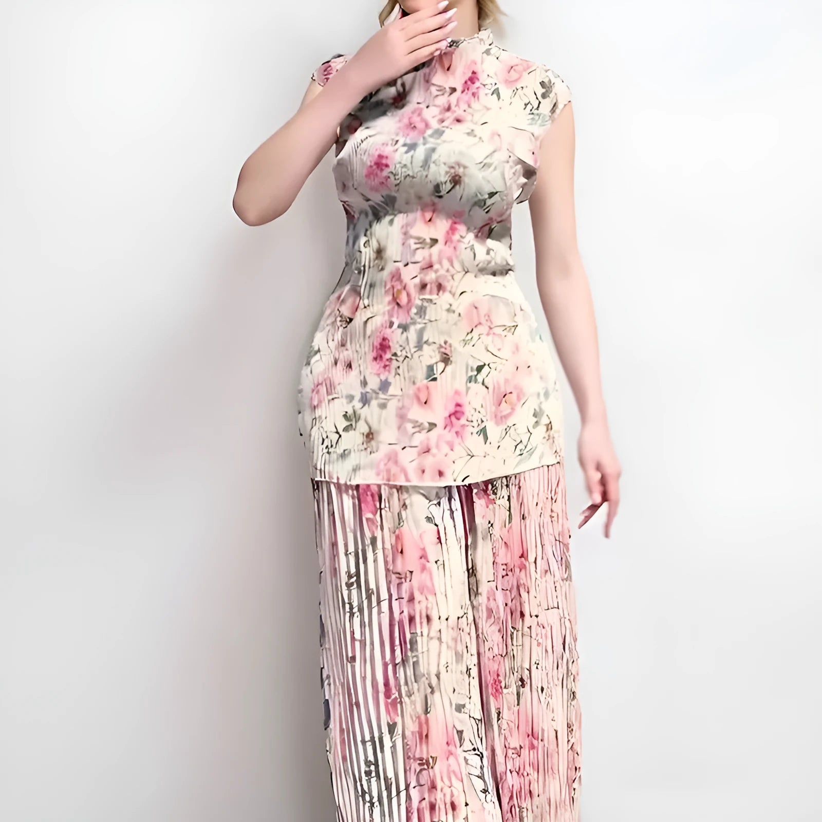 Long sleeve printed chiffon dress and top set on a hanger, showing high waist design.