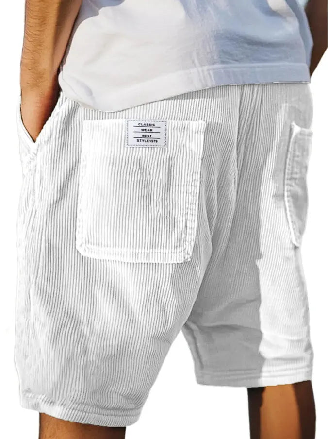 Men's grey straight-fit corduroy shorts with multiple pockets and a small embroidered logo on the leg.