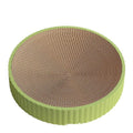 Green and white round cat scratching board with corrugated cardboard surface measuring 55cm across