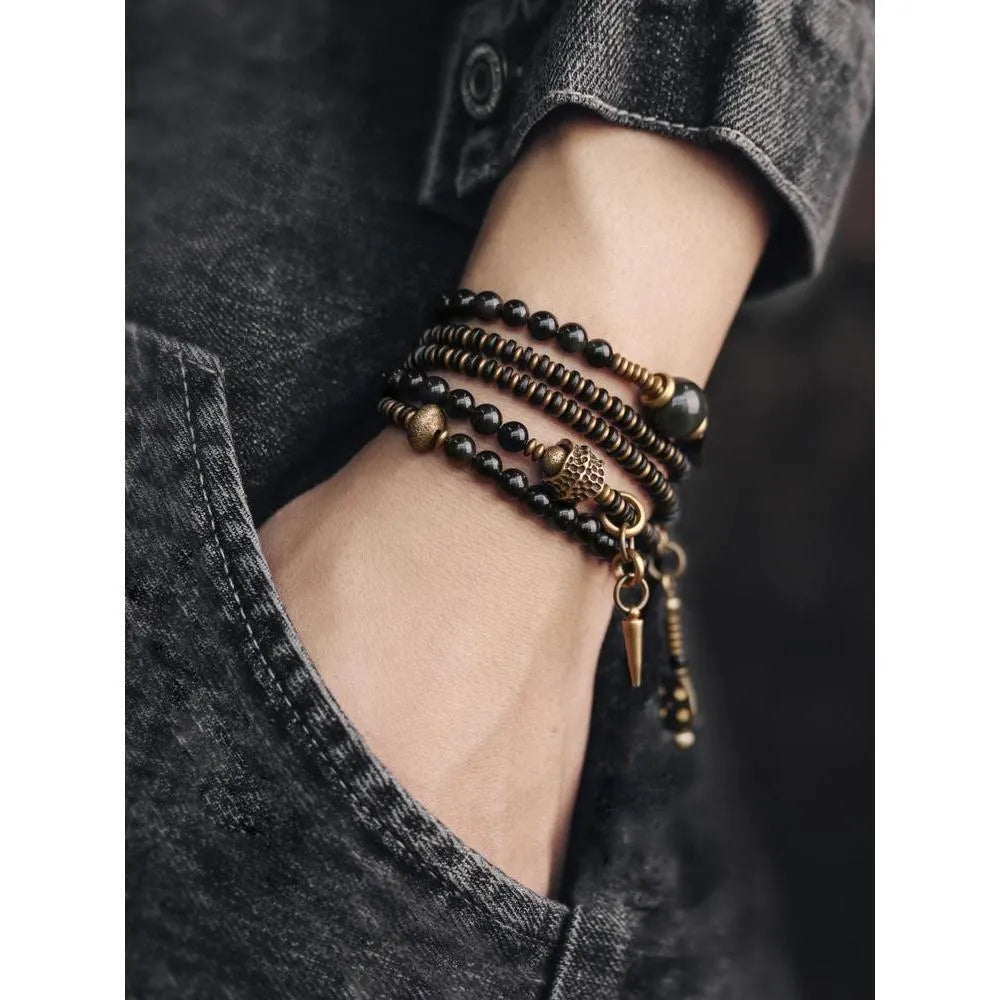 Black multi-layered beaded bracelet with geometric shape and natural retro styling