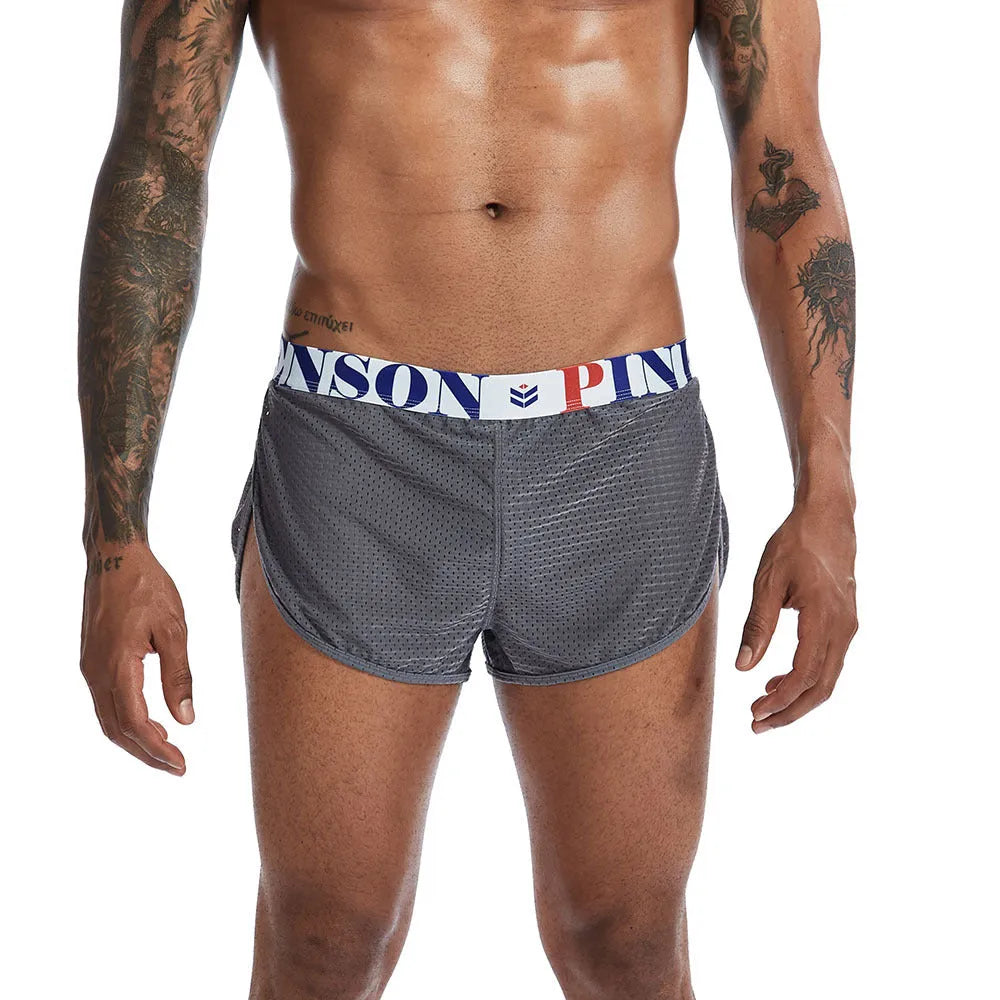 Men's solid colour nylon mesh boxer briefs on a white background showing mid-waist fit.