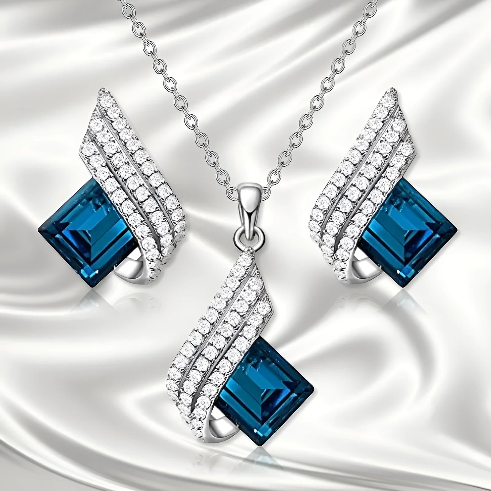 Glass and alloy necklace and earring set with cross chain styling and electroplated ornament details