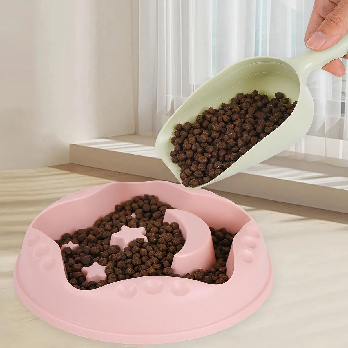 Moon Star Wings slow feeder dog bowl in blue colour with raised obstacles and anti-slip base.