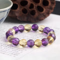 Handmade ametrine bracelet with 128-facet crystal beads in a choice of diameters and symbolic designs.