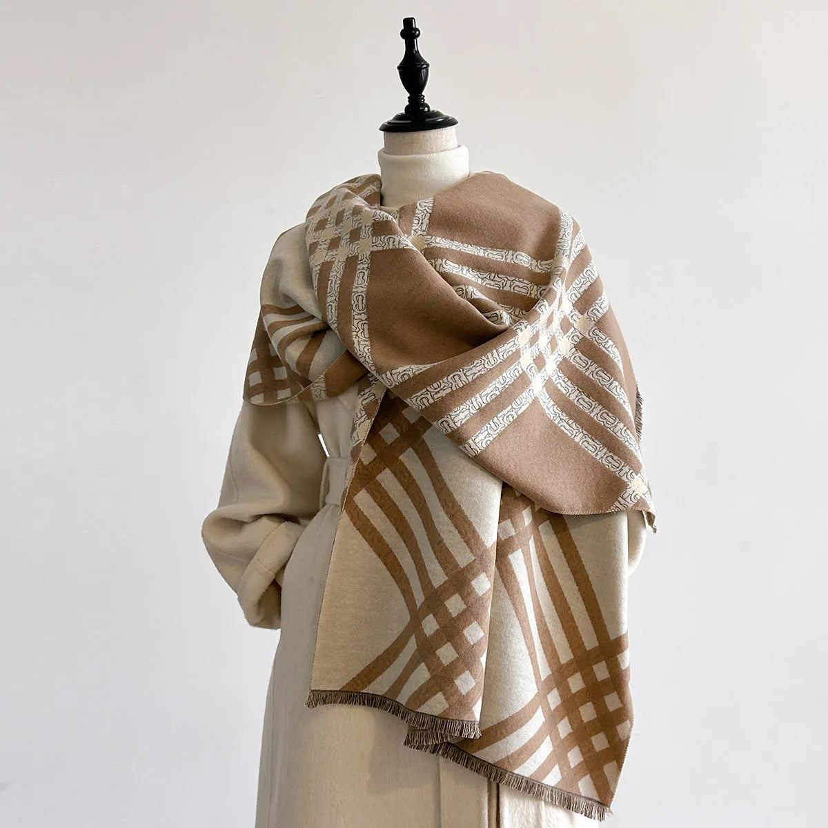 Mid-length cashmere-like scarf with tassels in brown colour showing 185cm length