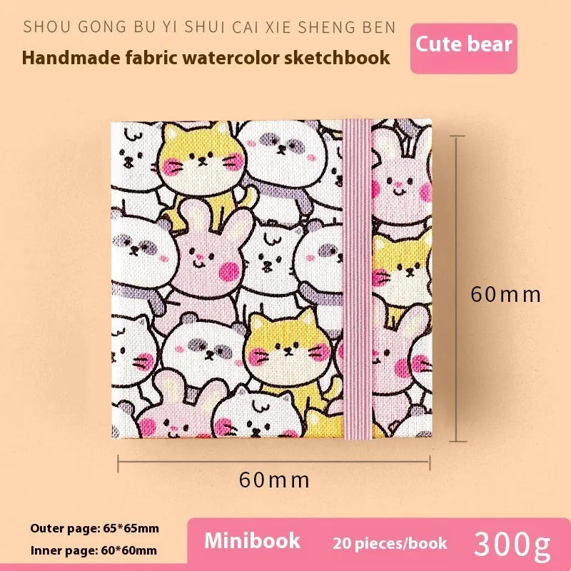 Feiluniao handmade fabric watercolour notebook in 185mm portable size, showing artistic cover design.