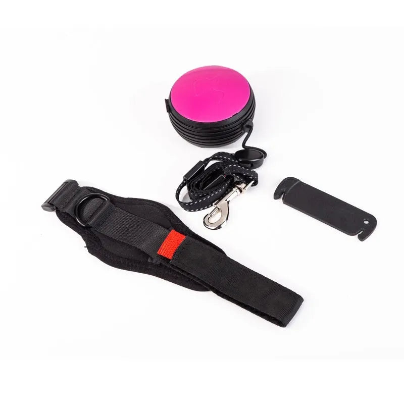 Retractable dog leash extended to 3 metres with automatic brake system in vibrant orange colour