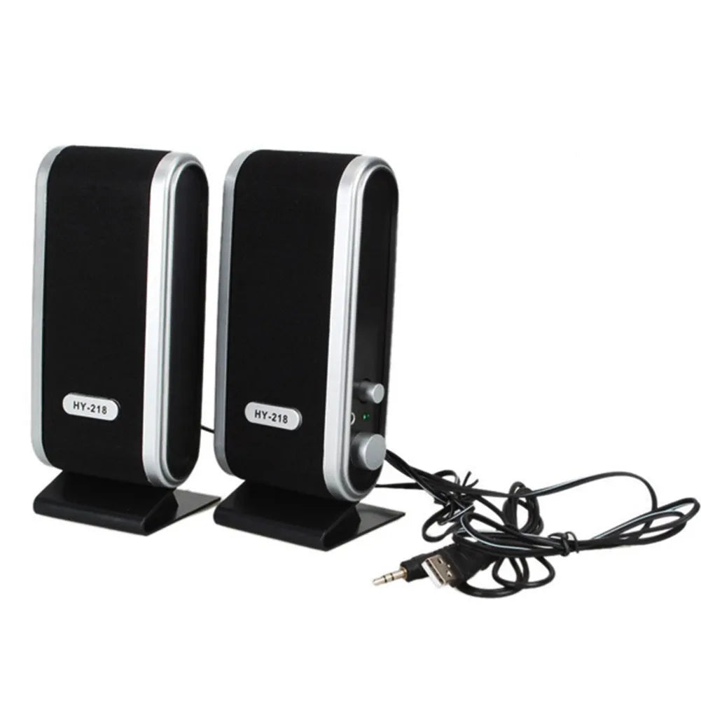 Compact black mini USB stereo speaker for notebook and desktop computers.