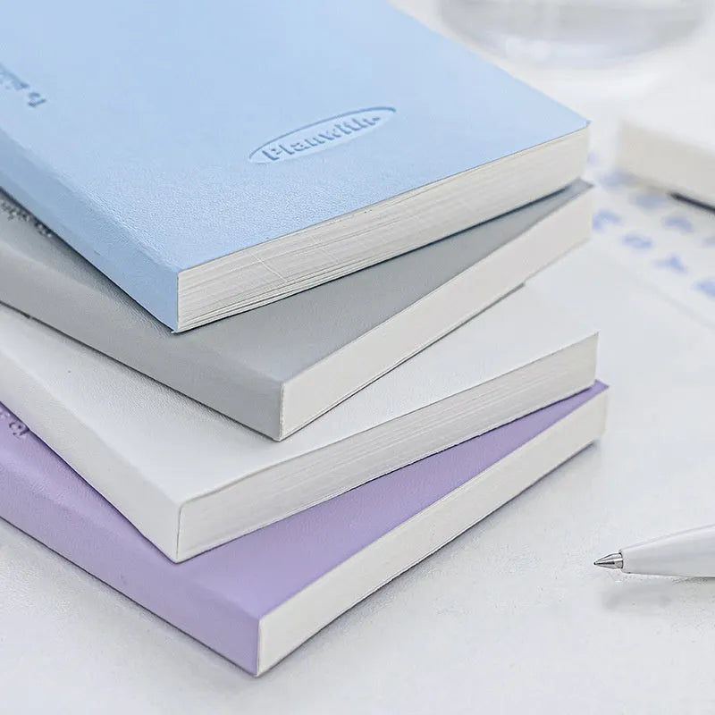 Embossed A5 daily meter notebook showing paper cover and open pages