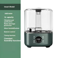 Green KC-112 intelligent humidifier with touch screen and remote control on a table.