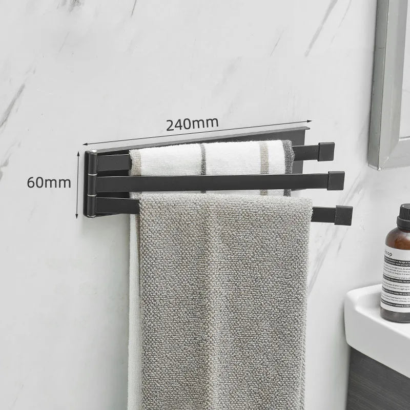 Black folding towel bar with adhesive installation for a no-drill bathroom fit.