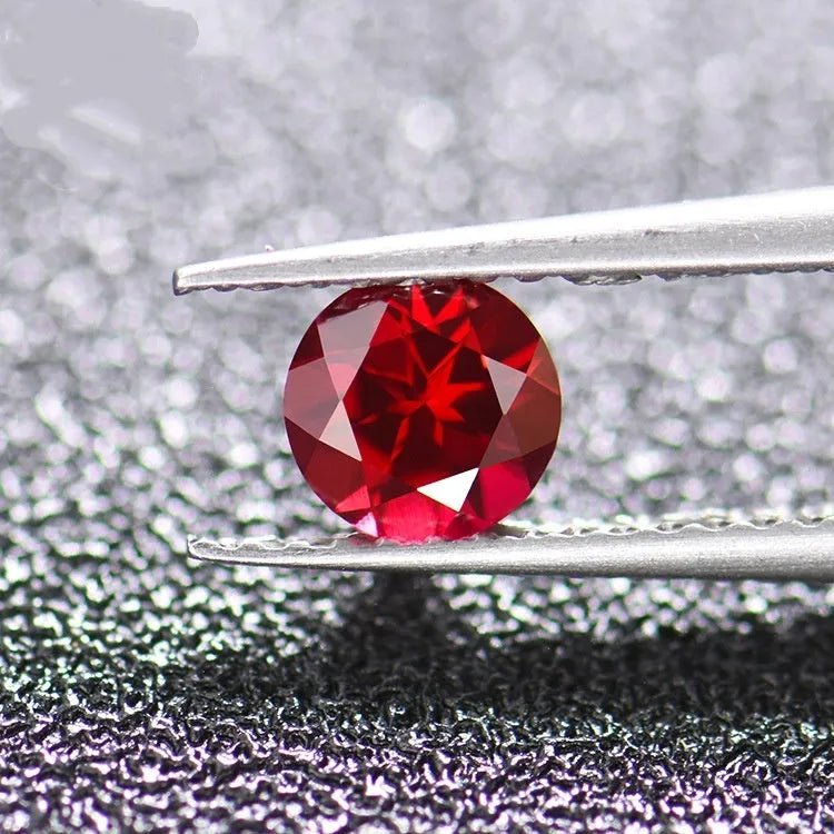 Lab-created ruby gemstone in egg, round, princess, water drop, grandmother, and Asche cuts.