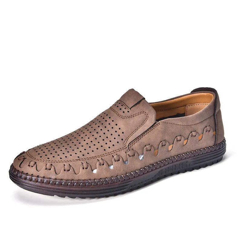 Men's brown slip-on casual shoes with round toe and flat heel on a white background