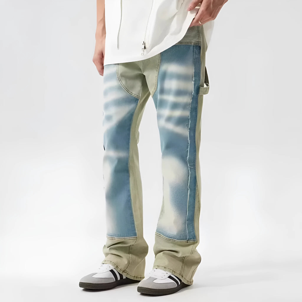 Yellow and blue retro patchwork distressed jeans with splash-ink design details on mid-waist denim trousers