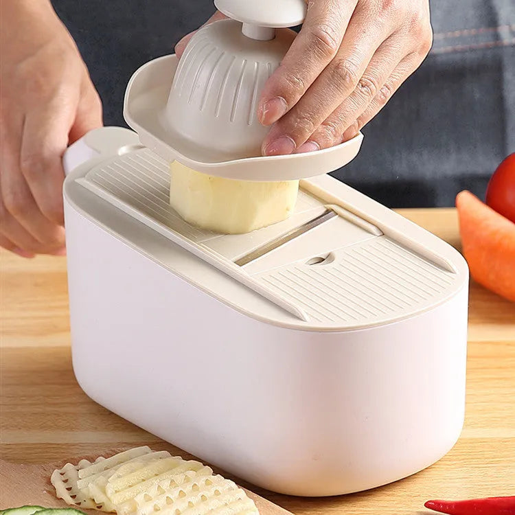 Multifunctional vegetable cutter in Nordic style with stainless steel blades, available in blue, grey, and khaki colours