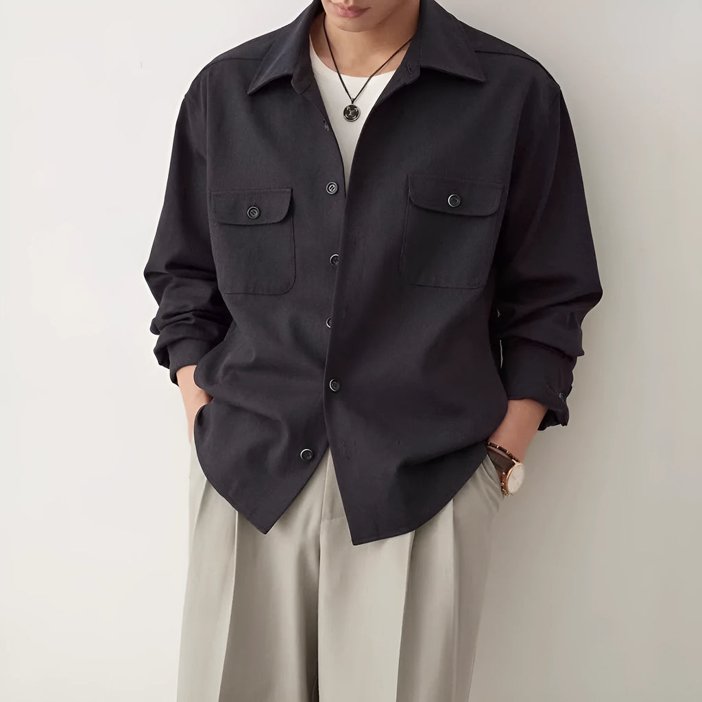 Men's light sand rice coloured long sleeve shirt with a simple lapel and collage stitching.