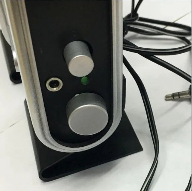 Compact black mini USB stereo speaker for notebook and desktop computers.