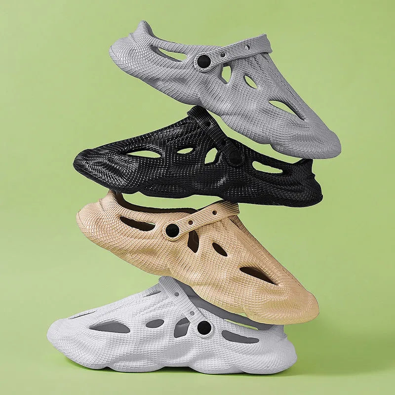 EVA soft men's summer beach shoes in grey colour on sandy surface