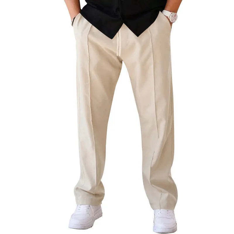 Men's loose straight drawstring trousers in waffle polyester fabric, shown in multiple colour options