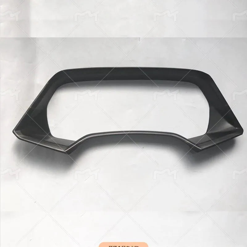 BMW X5 dashboard decorative frame in carbon fibre or peach wood finish with adhesive backing