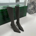 Women's black pointed toe below knee boots with back zipper and stiletto heel