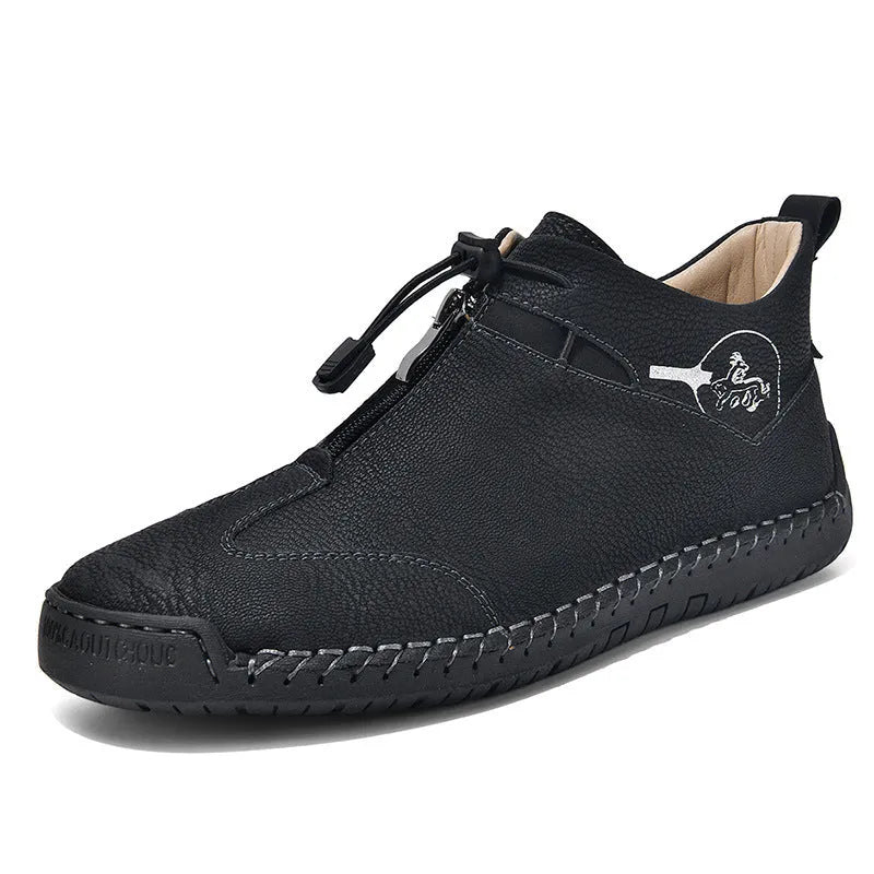 Men's black casual leather shoes with round toe and mid heel on a rubber sole