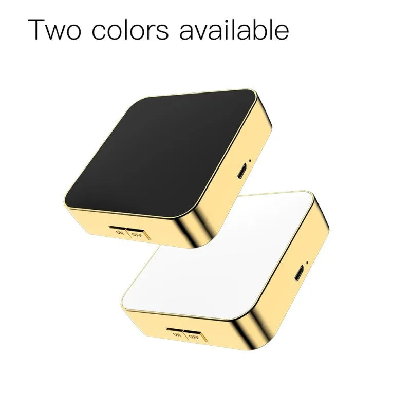 Black and white lighted makeup mirror with 4x magnification lens and adjustable LED lighting