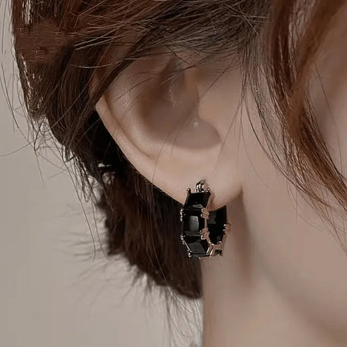 Gold-plated geometric ear ring with U-shaped design and round elements