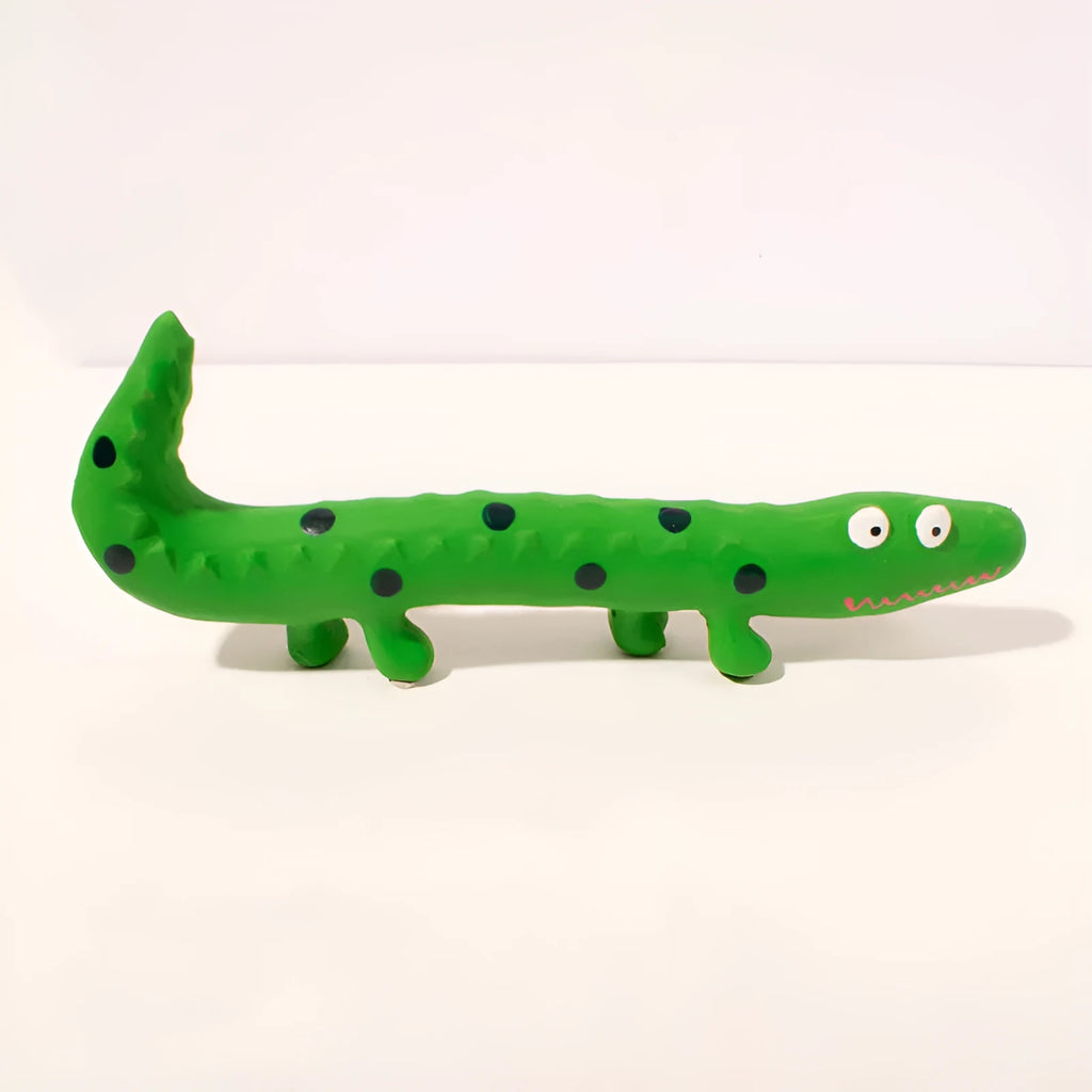 Green cartoon lizard-shaped latex dog chew toy with squeaker for aggressive chewers.