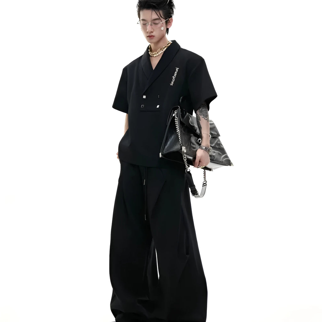 Men's dark cotton sports suit with padded shoulder V-neck top and matching shorts with metal embellishments