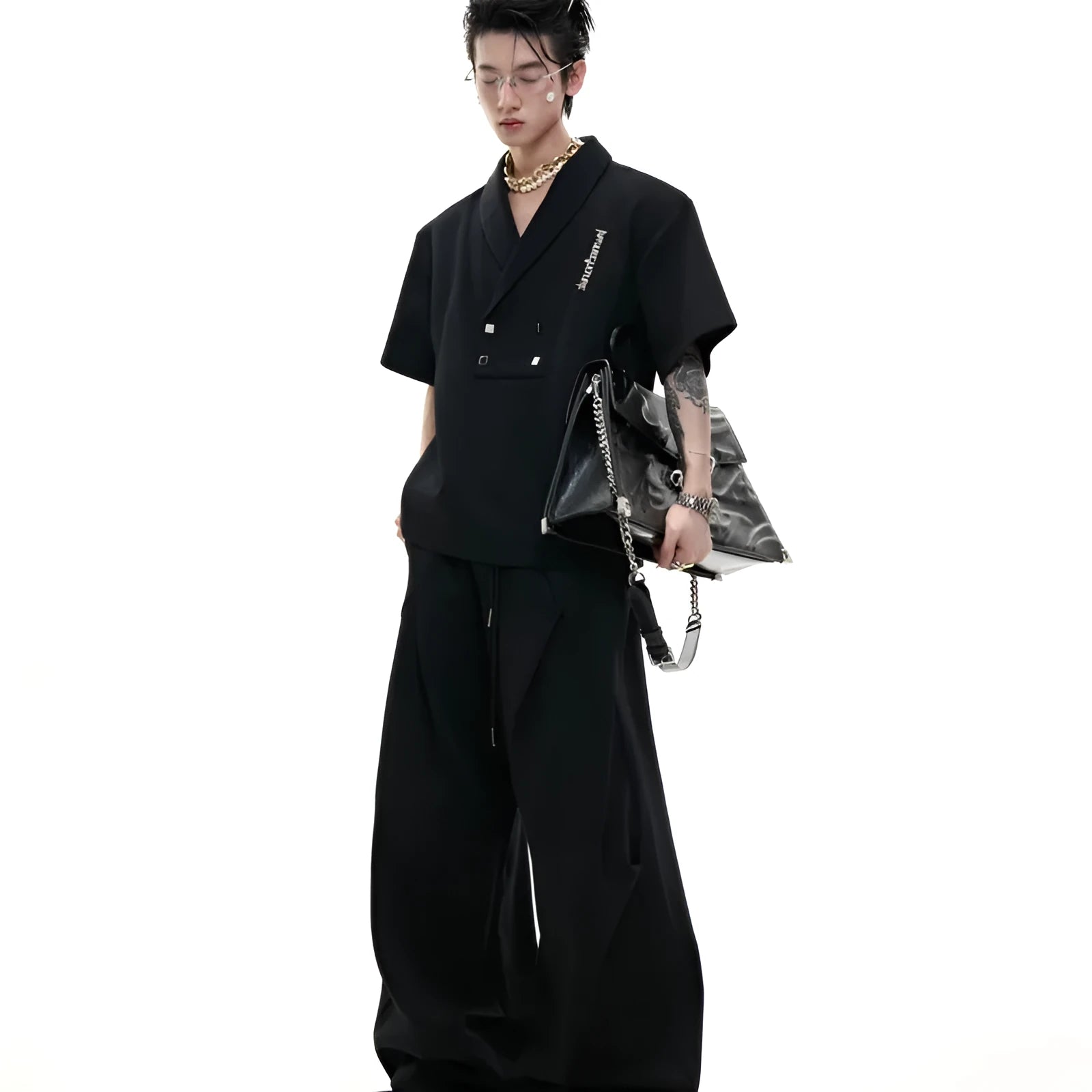 Men's dark cotton sports suit with padded shoulder V-neck top and matching shorts with metal embellishments