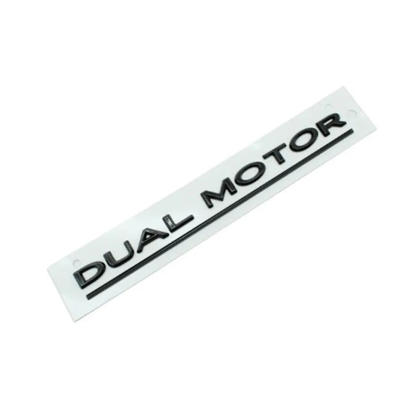 Black and red ABS plastic performance letter sticker for Tesla Model 3 bumper, measuring 19cm long.