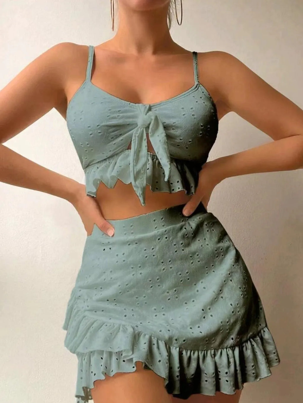 Women's three-piece bikini swimsuit with split hip skirt in solid colours