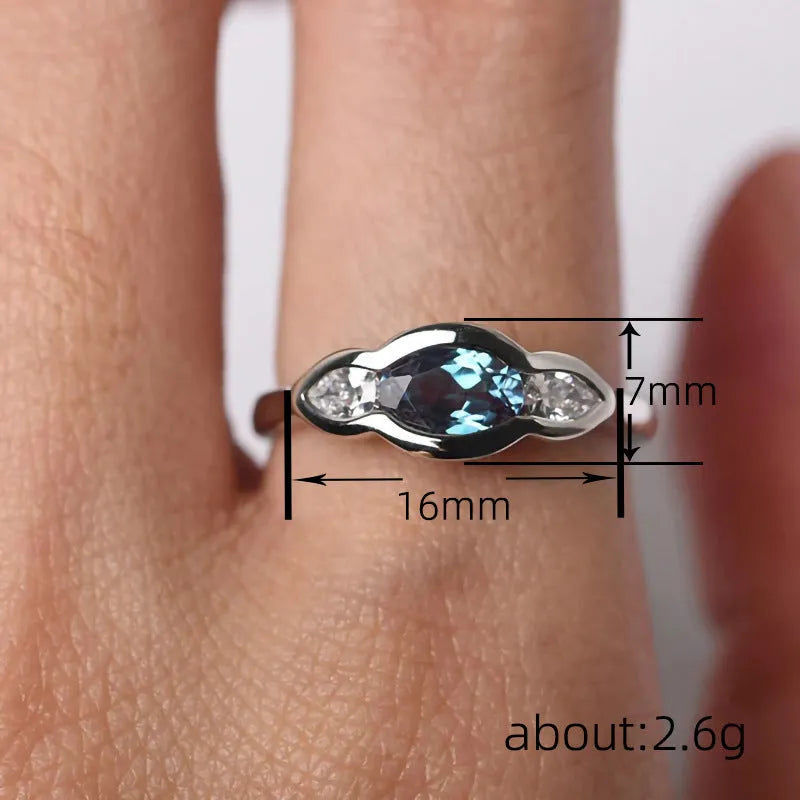 Women's geometric ellipse fashion ring with zircon stones and white gold plating