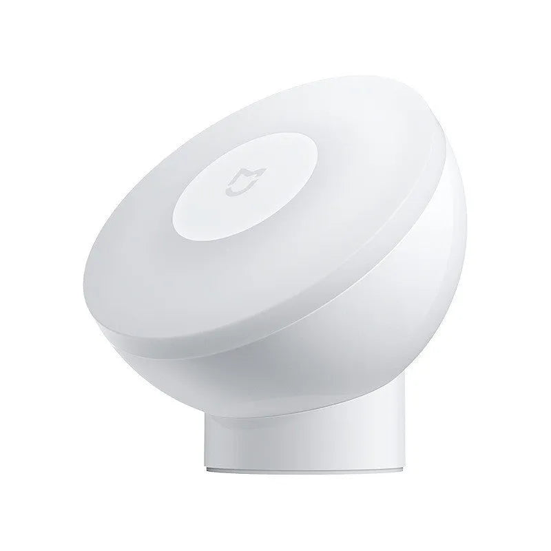 White modern Mijia Night Light 2 Bluetooth bedside lamp with motion sensor on a table.
