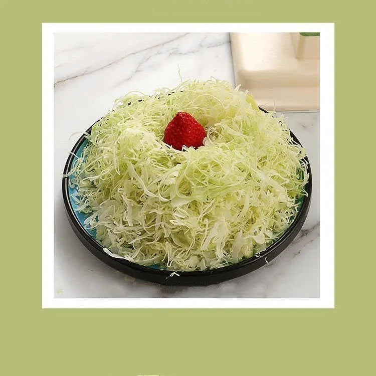 Beige multifunctional stainless steel vegetable slicer, chopper, and grater kitchen tool.