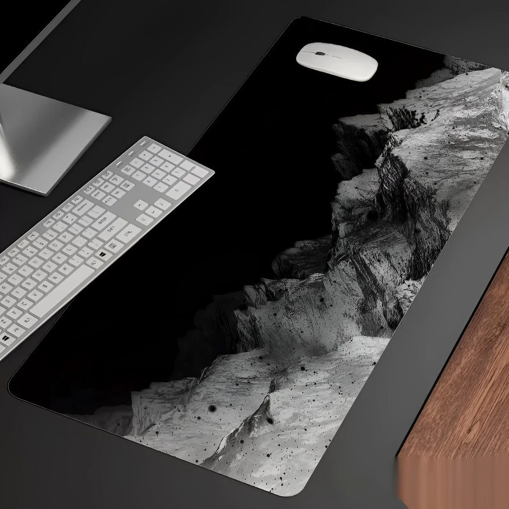 Oversized gaming mouse pad with cold-themed design on natural rubber base