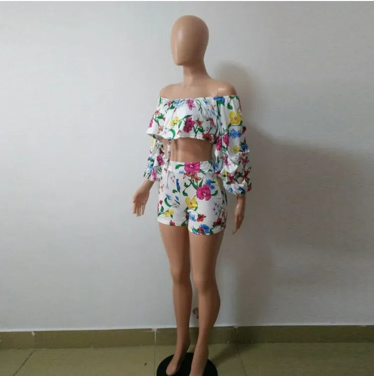 Women's multicolour digital print two-piece set with pile sleeve top and matching shorts.