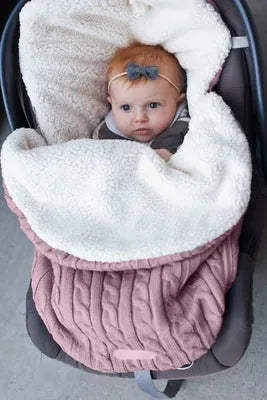 Envelope-style baby stroller sleeping bag in a choice of colours with cotton wool filling.