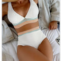 Women's high waist solid colour bikini swimsuit set in pink or white.