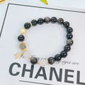 Silver stone bracelet for women with electroplated finish showing flower, love heart and star charm options