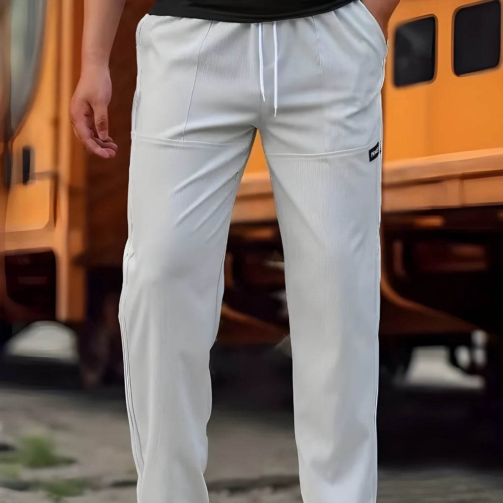 Men's casual polyester trousers for spring and autumn in various colours including light gray and black