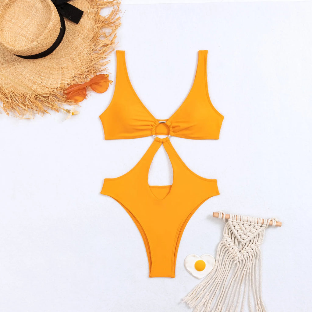 Women's black triangle one-piece nylon swimsuit on a mannequin, sleeveless design.
