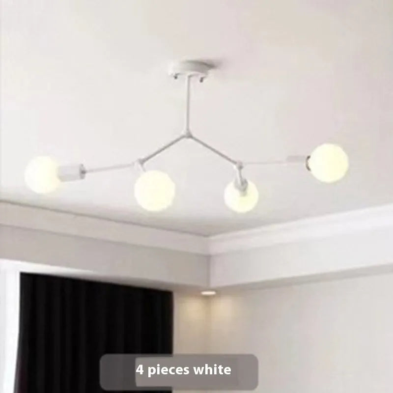 Nordic style iron ceiling chandelier with multiple black heads against a white background.