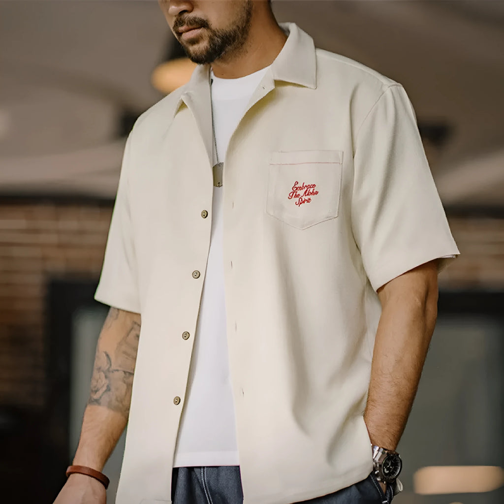 Men's light apricot Cuban collar shirt with bamboo and floral pattern design