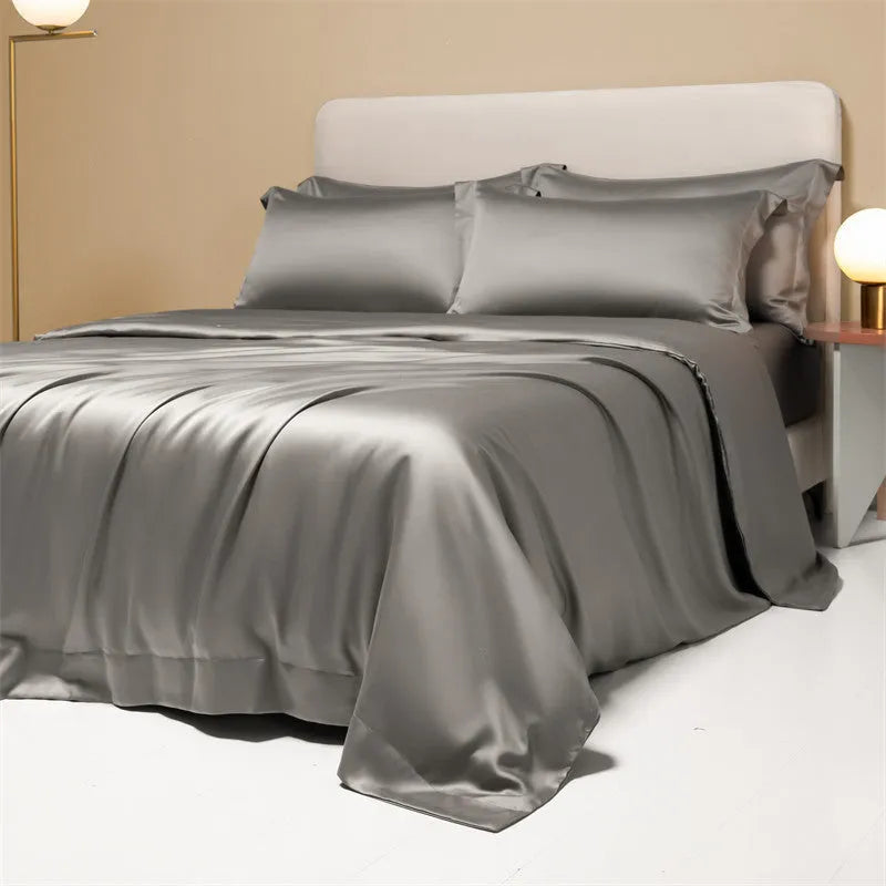 Luxury Tencel Lyocell bedding set with quilt cover, sheet, and pillowcases in grey.