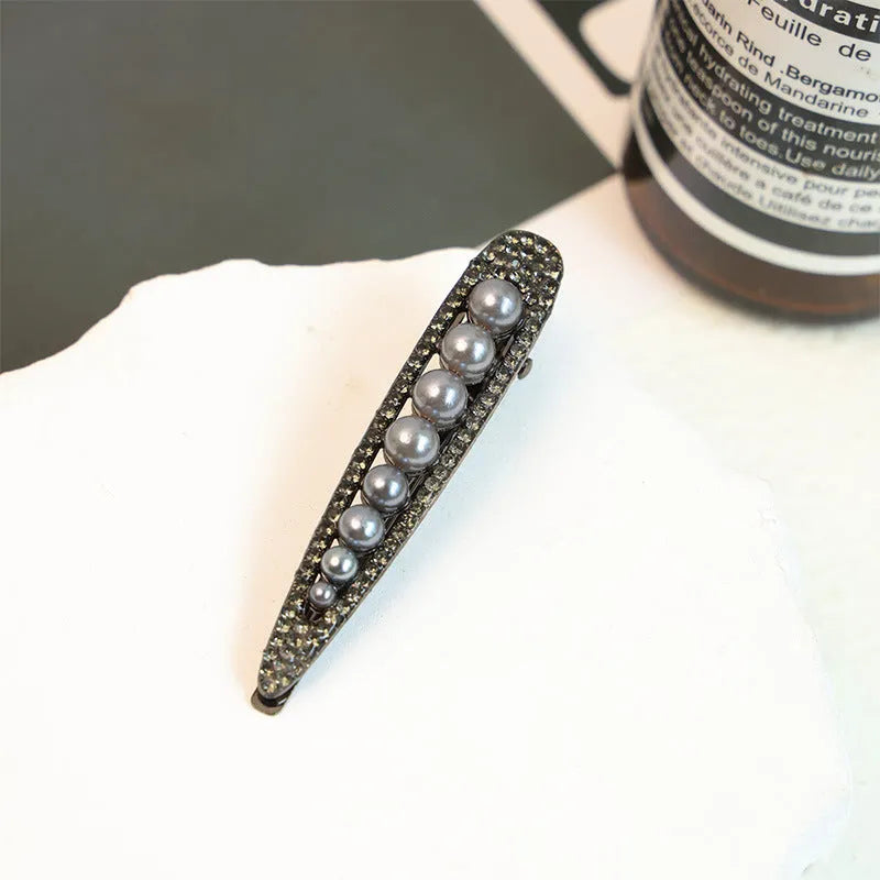 Alloy pearl front duck barrette for women with electroplated finish in black vintage pearl style