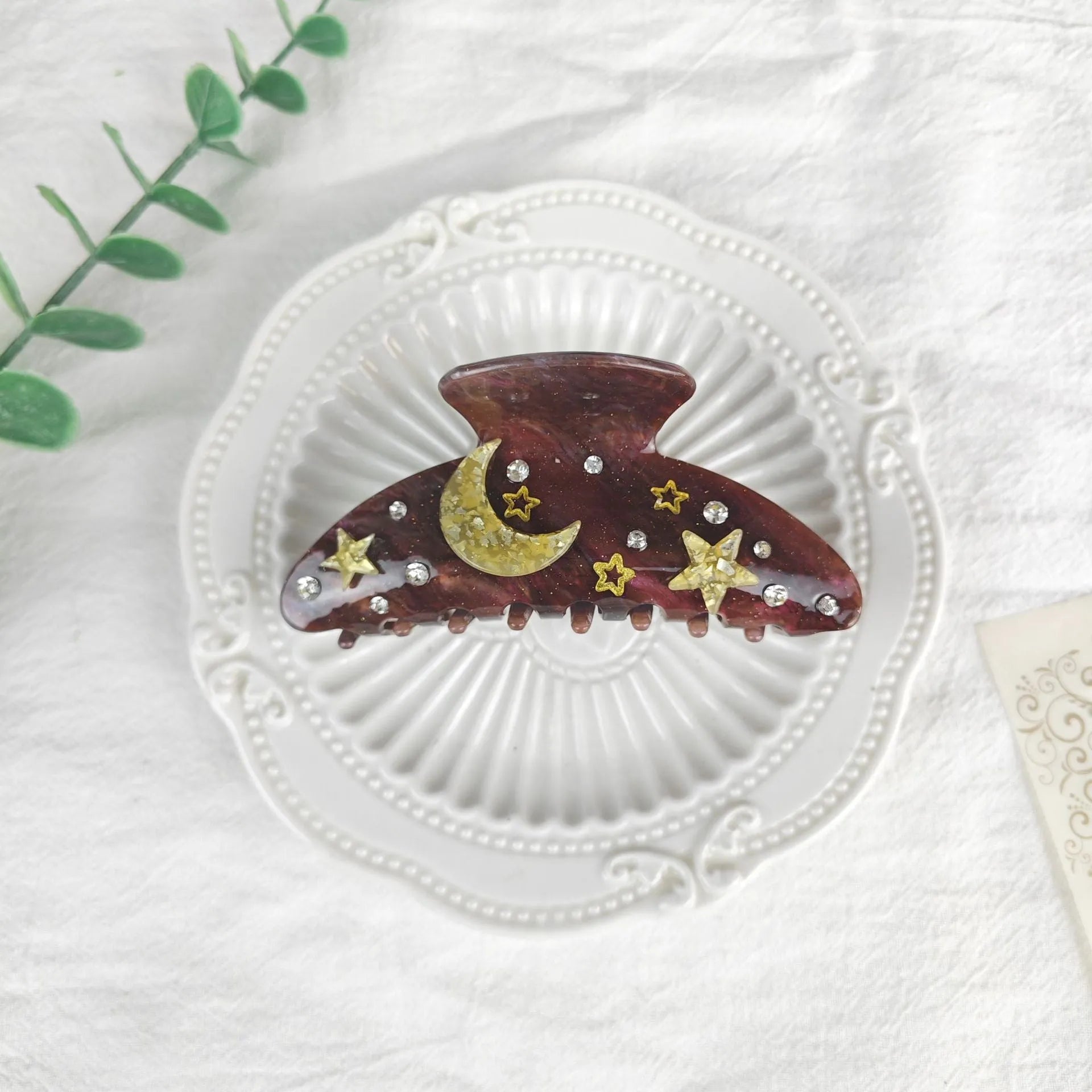 Oversized women's hair barrette with a starry sky pattern in sky blue.
