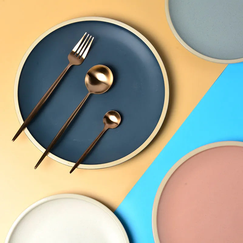 Pure blue matte finish 10-inch ceramic dinner plate on a table.